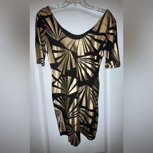 Black and gold pattern mini dress